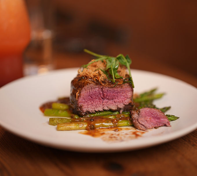 Gourmet steak served with asparagus on a plate
